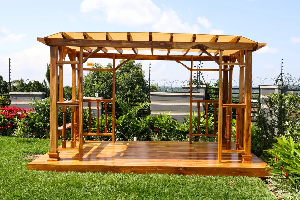 Timber pergola on a hardwood deck in a landscaped garden